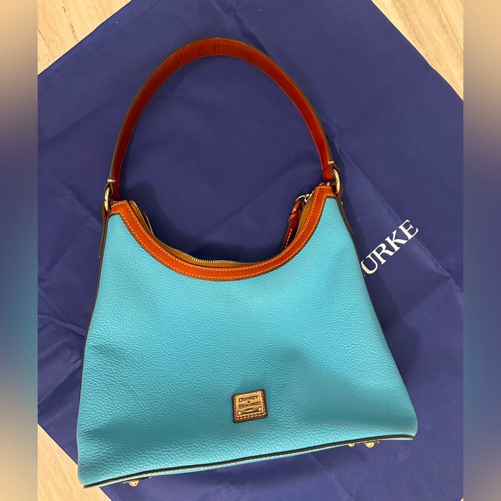 Dooney & Bourke Used! This shoulder bag, crafted,Italian pebbled leather! Used